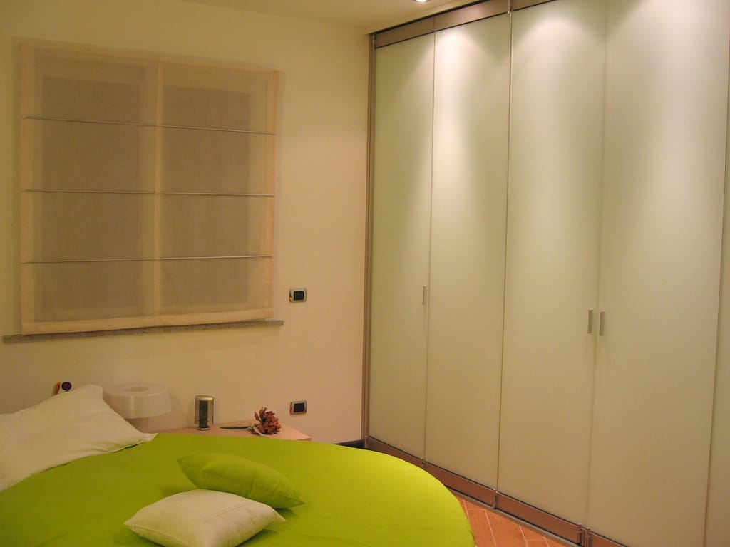 Cabina armadio con ante a libro